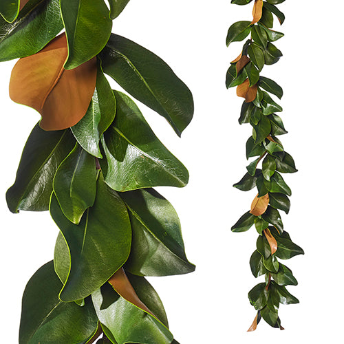 Foam magnolia leaf garland in white with plastic stems arranged in a natural curved silhouette.