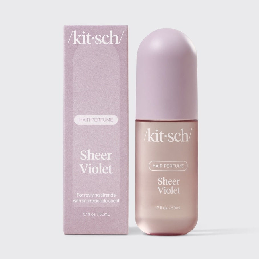 Sheer violet hair perfume bottle with floral fruity musk scent in a travel-friendly size.