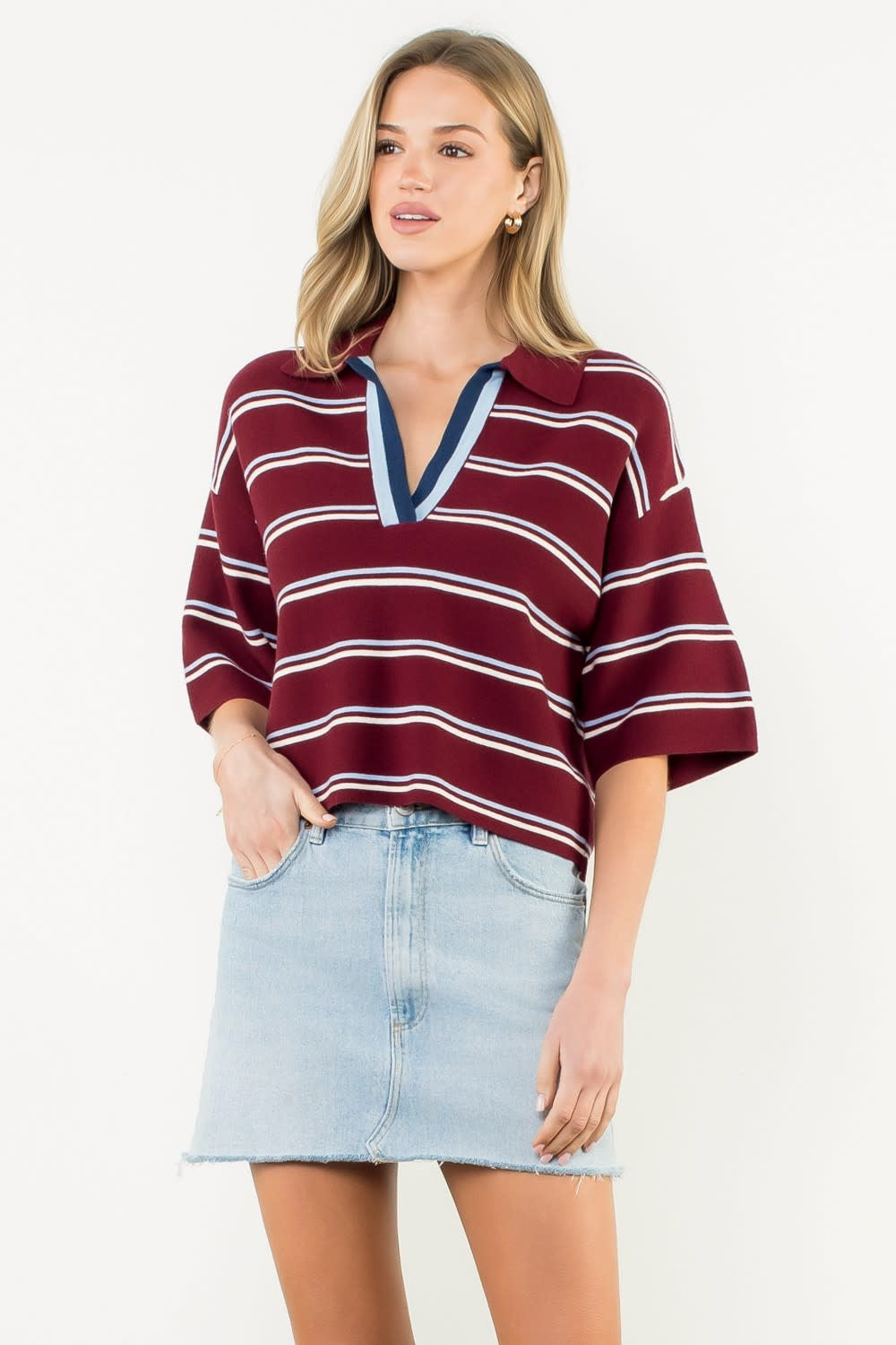 Burgundy short-sleeve striped knit top with a relaxed fit.