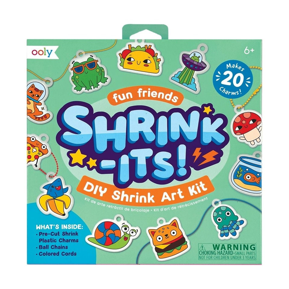DIY shrink art kit with pre-cut plastic charms shaped like smiling tacos, snails, fish, and mushrooms.