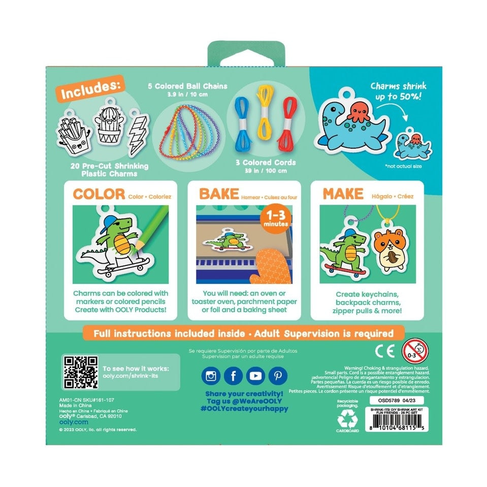 DIY shrink art kit with pre-cut plastic charms shaped as smiling tacos, snails, fish, and mushrooms.