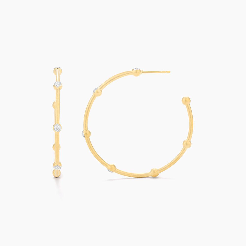 Evelyn medium hoop earrings with genuine diamonds in a sleek silver finish.