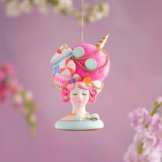 Marie Sweet Ornament, a hand-painted resin bust with pink hair and a candy-themed headpiece.