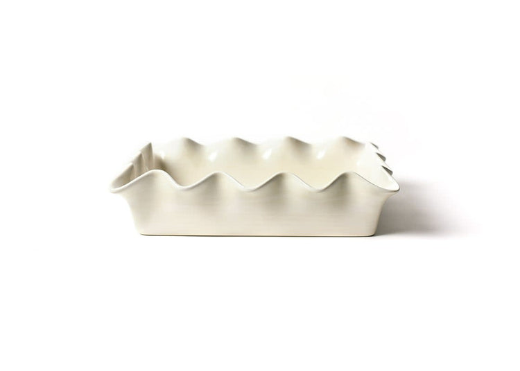 White earthenware casserole dish with signature ruffle rim edge