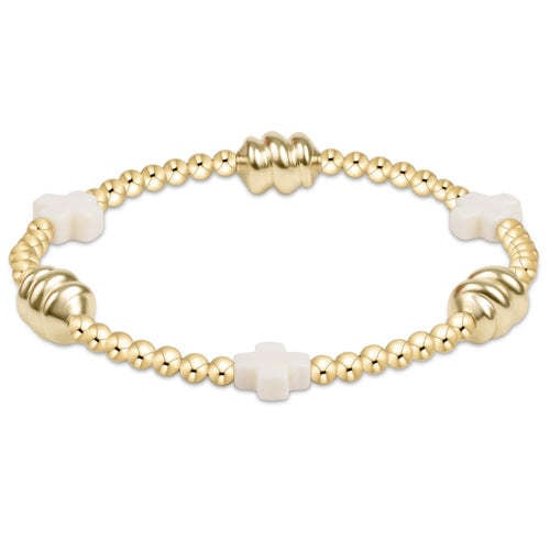 Off-white signature cross bead bracelet with gold-filled admire beads on elastic cord