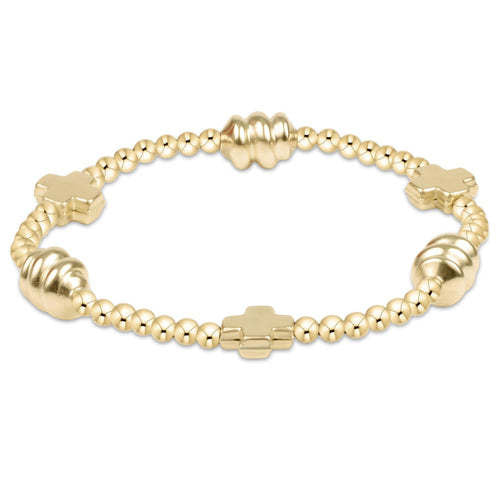 Gold-filled signature cross bracelet with admire beads on elastic cord