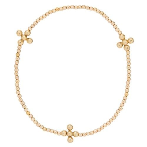 Gold-filled beaded bracelet featuring a signature cross pendant on a classic chain.