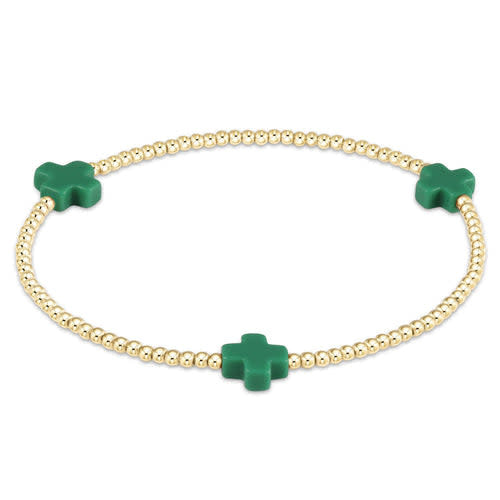 Gold-filled Signature Cross bead bracelet with a cross pattern on high-performance elastic.