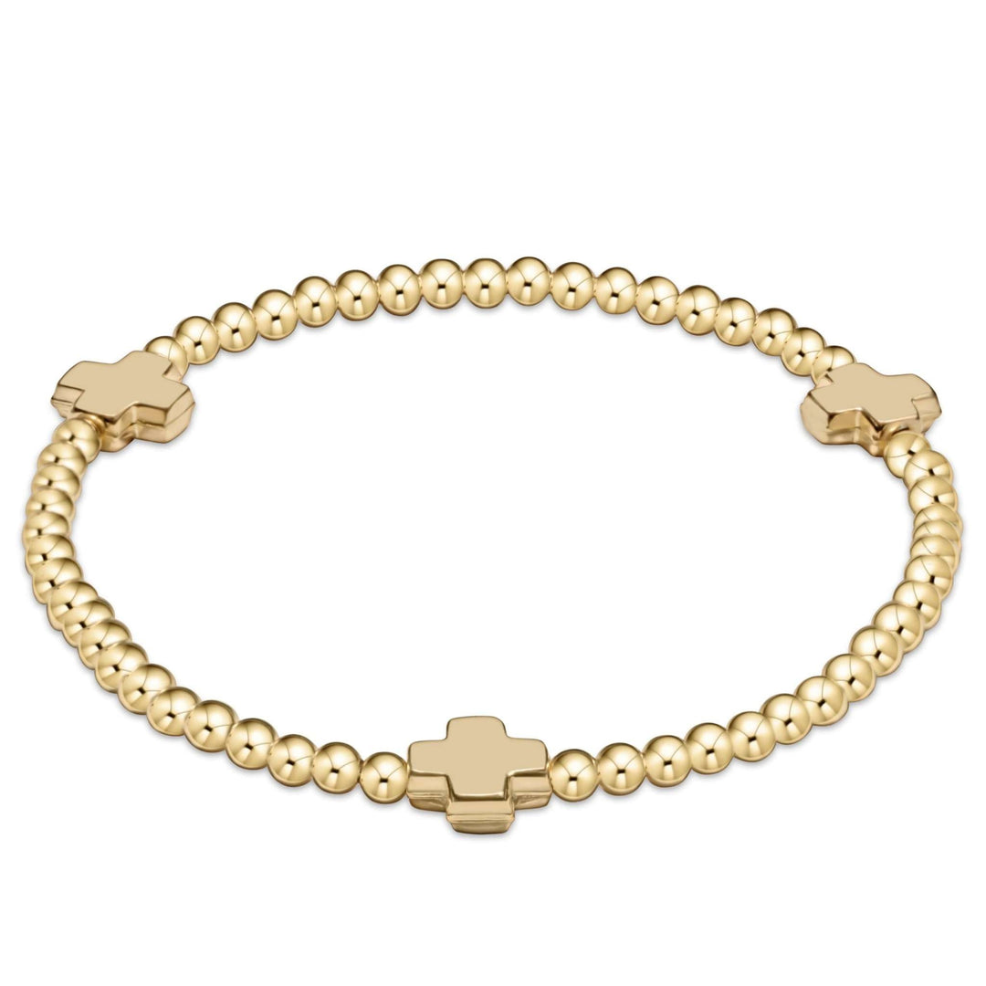 Gold-filled bracelet with signature cross beads on elastic cord