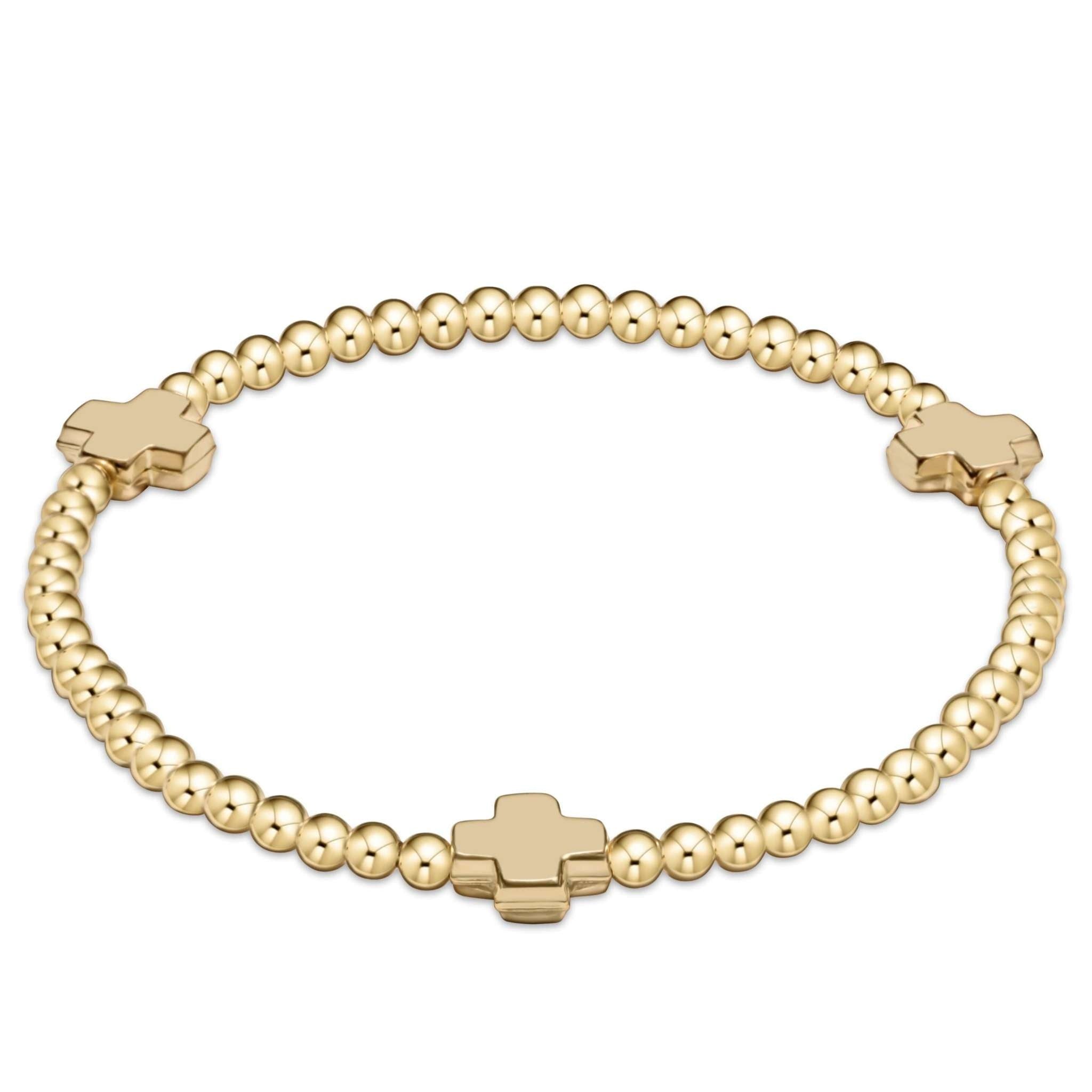 Gold-filled bracelet with signature cross beads on elastic cord