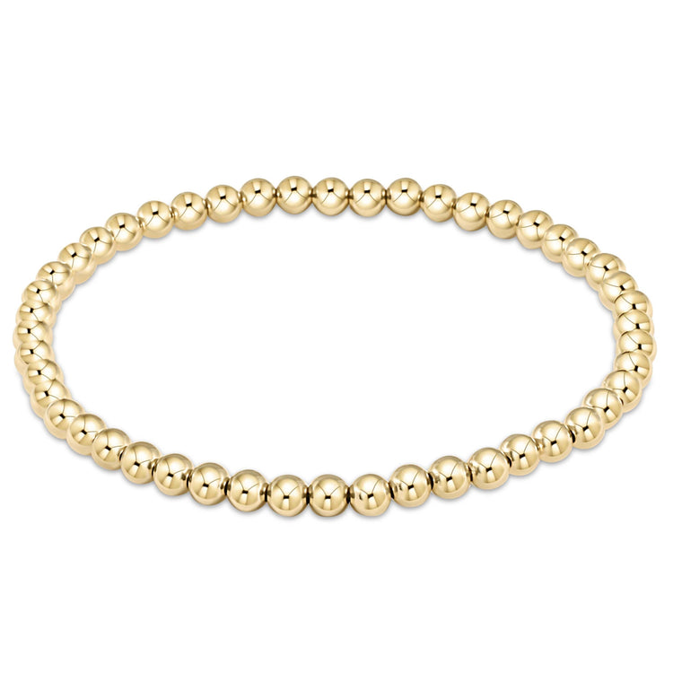 Classic gold-filled bracelet featuring four-millimeter beads on a seven-and-a-half-inch chain.
