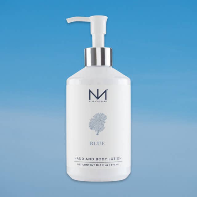 Niven Morgan Blue Hand and Body Lotion in a white pump bottle against a blue background.