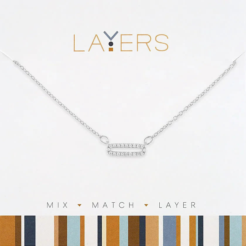 Silver-colored cubic zirconia single link layered necklace with delicate chain links.