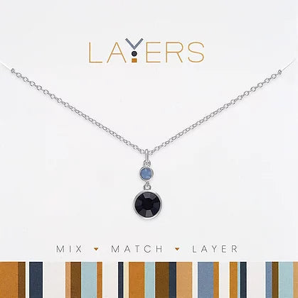 Silver Montana Blue layered necklace with drop stone pendants on a chain.