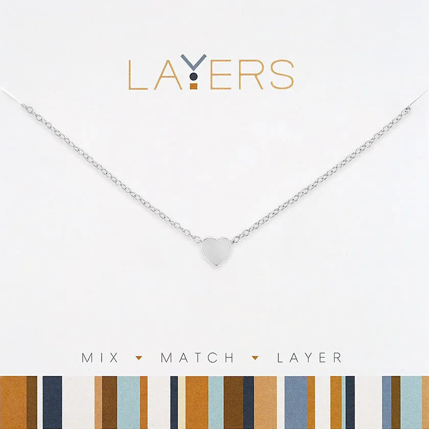 Silver layered necklace featuring heart-shaped pendants with a hypoallergenic finish.