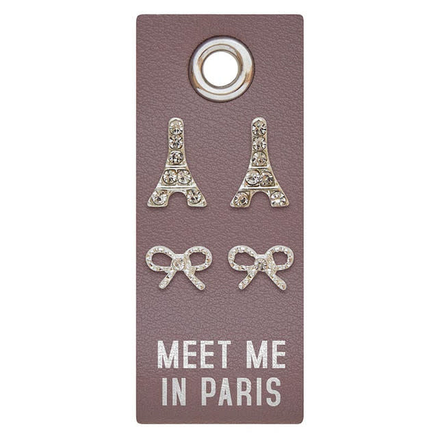 Silver stud earrings featuring a PU leather tag with rhinestone accents.