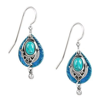 Silver stainless steel teardrop dangle earrings with teal filigree pattern.