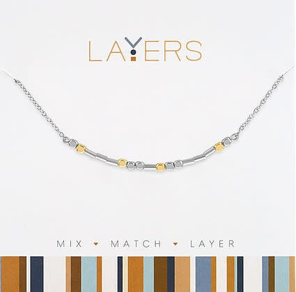 Silver two-tone mini beaded layered necklace with mixed metallic beads on sleek chains