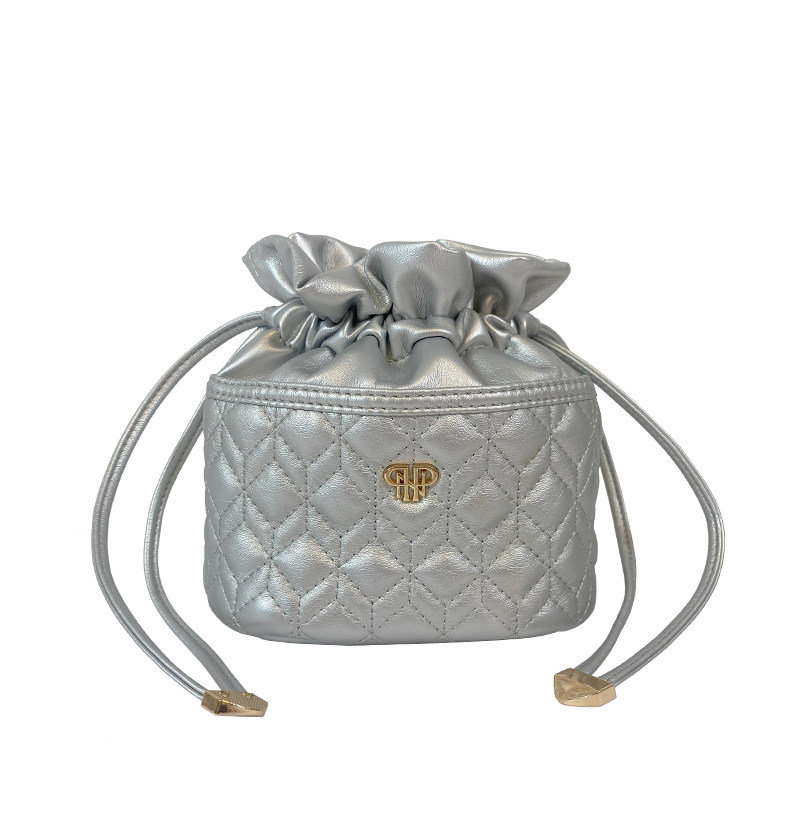 Silver vegan leather jewelry case with suede interior and ten clear removable pouches.