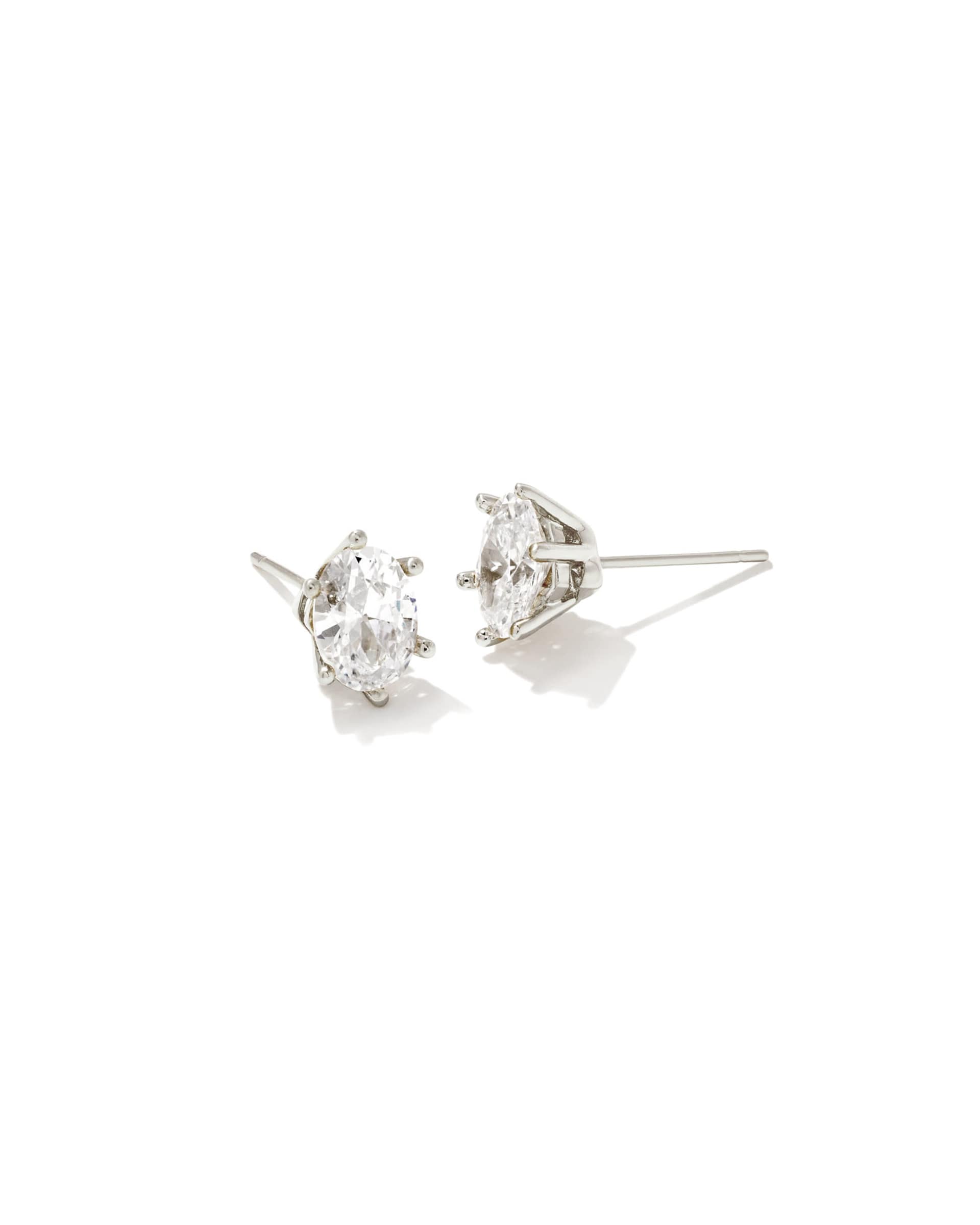 Silver post stud earrings featuring white cubic zirconia crystals in a round silhouette.