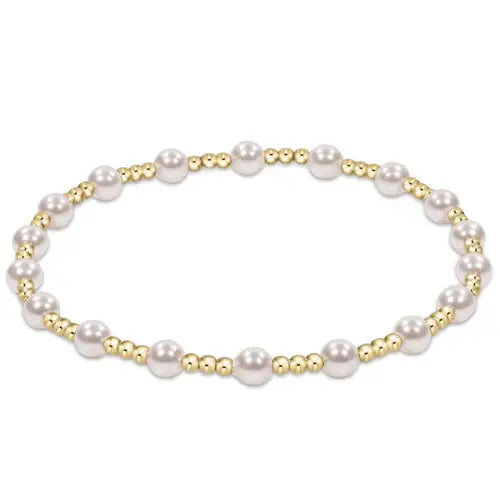 Extends Sincerity bracelet featuring alternating 4mm crystal pearls and 2mm gold-filled beads on elastic cord.