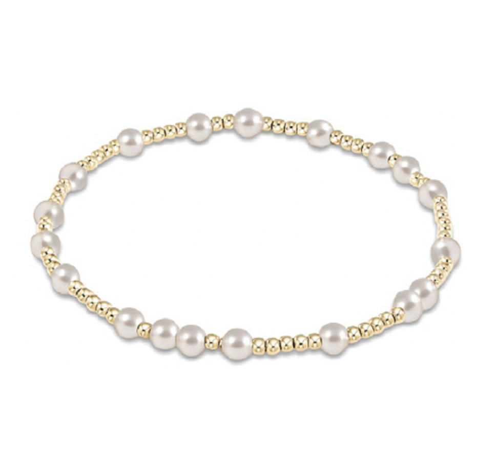 Hope Unwritten bracelet featuring hand-beaded 4mm pearls alternating with 2mm gold-filled beads on stretch elastic cord.