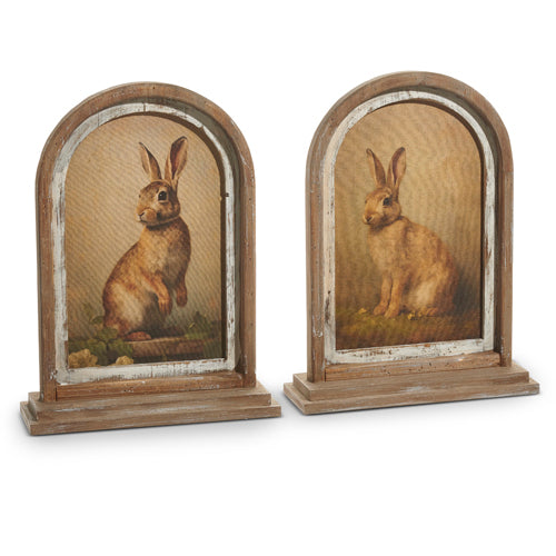 Wood-framed vintage print on linen featuring a rabbit silhouette in muted tones.