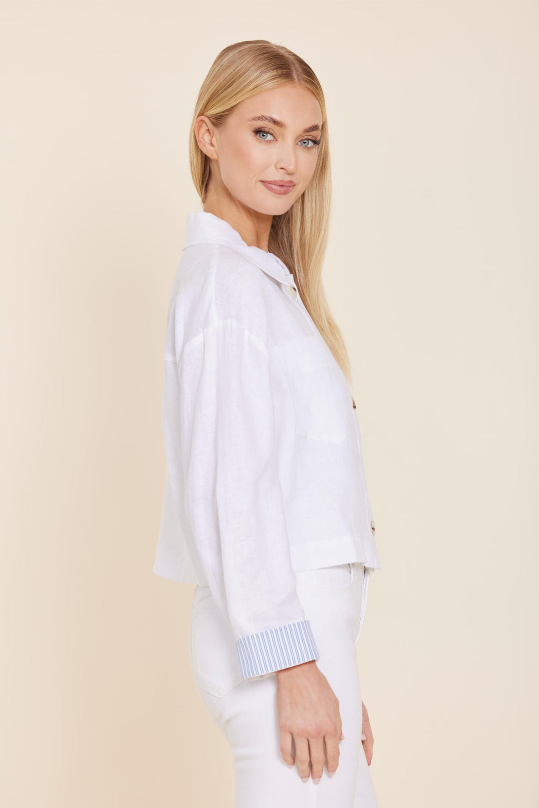 Relaxed fit Grace linen jacket with button-up front and pin stripe cuffs in natural color.