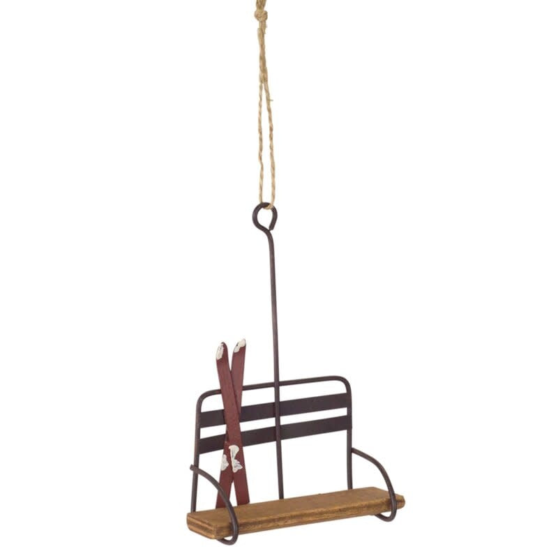 Wooden ski lift chair ornament with snow-tipped skis on seat
