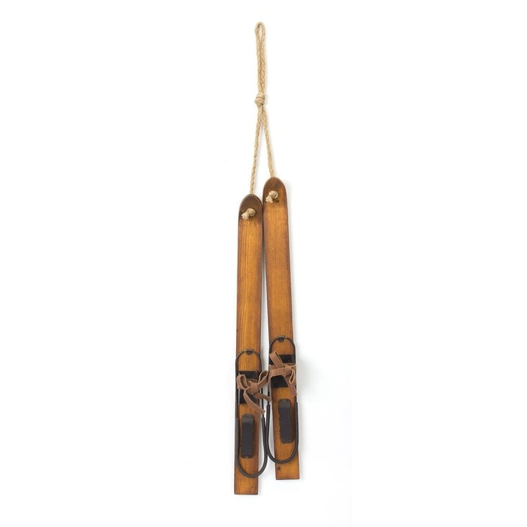 Wooden ski-shaped Christmas tree ornament with natural finish.