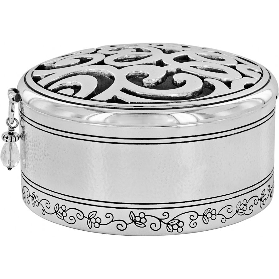 Silver hammered round trinket box featuring a freehand scribble art scrolled pattern on the lid.