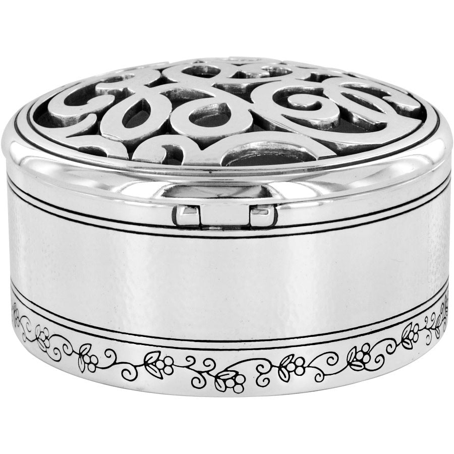 Silver hammered round trinket box with a scribble art scrolled pattern top.