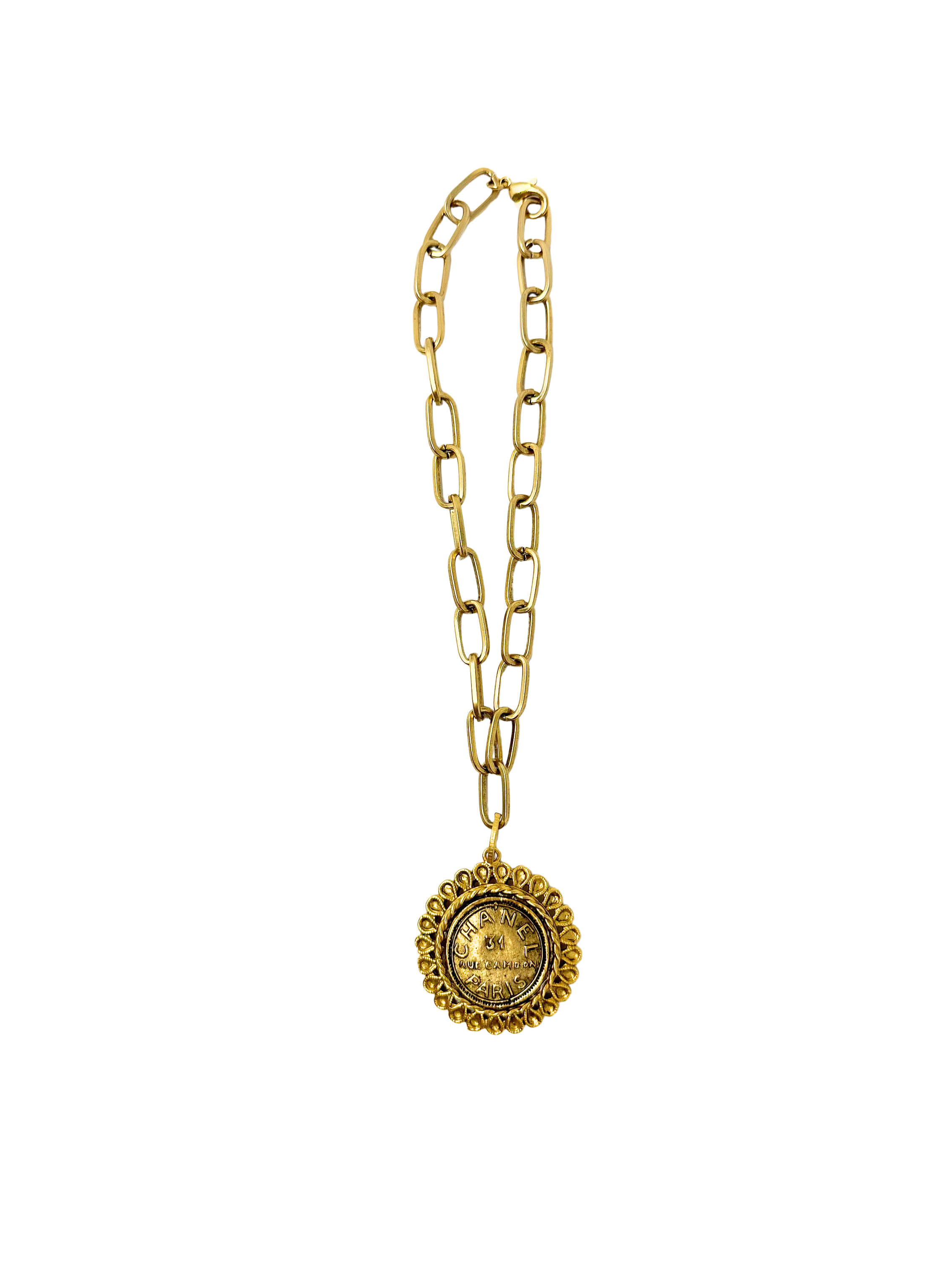 17 inch gold paper clip chain necklace with a round designer inspired coin pendant.