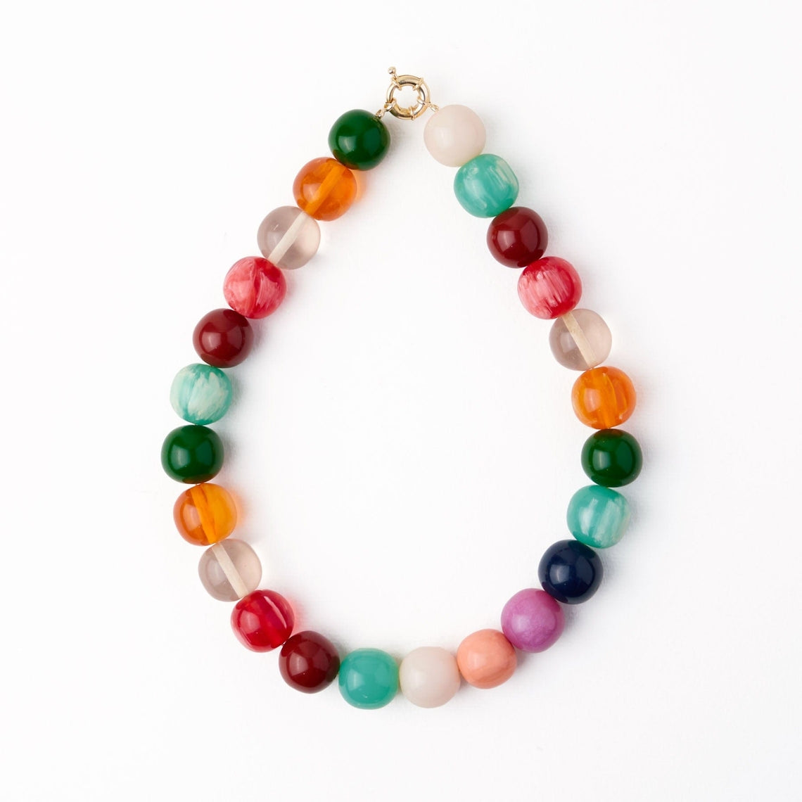 Iris Large Resin Bead Necklace featuring oversized, multicolored round beads in a circular layout.