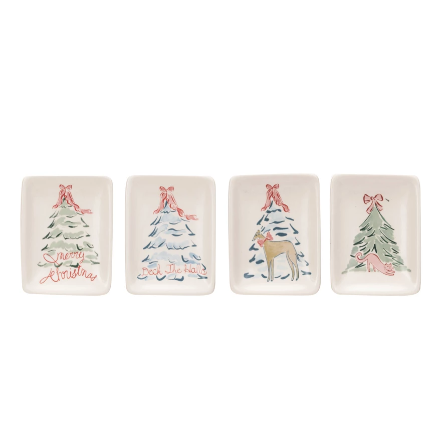 Stoneware dish featuring a Christmas tree with animals and text on white background