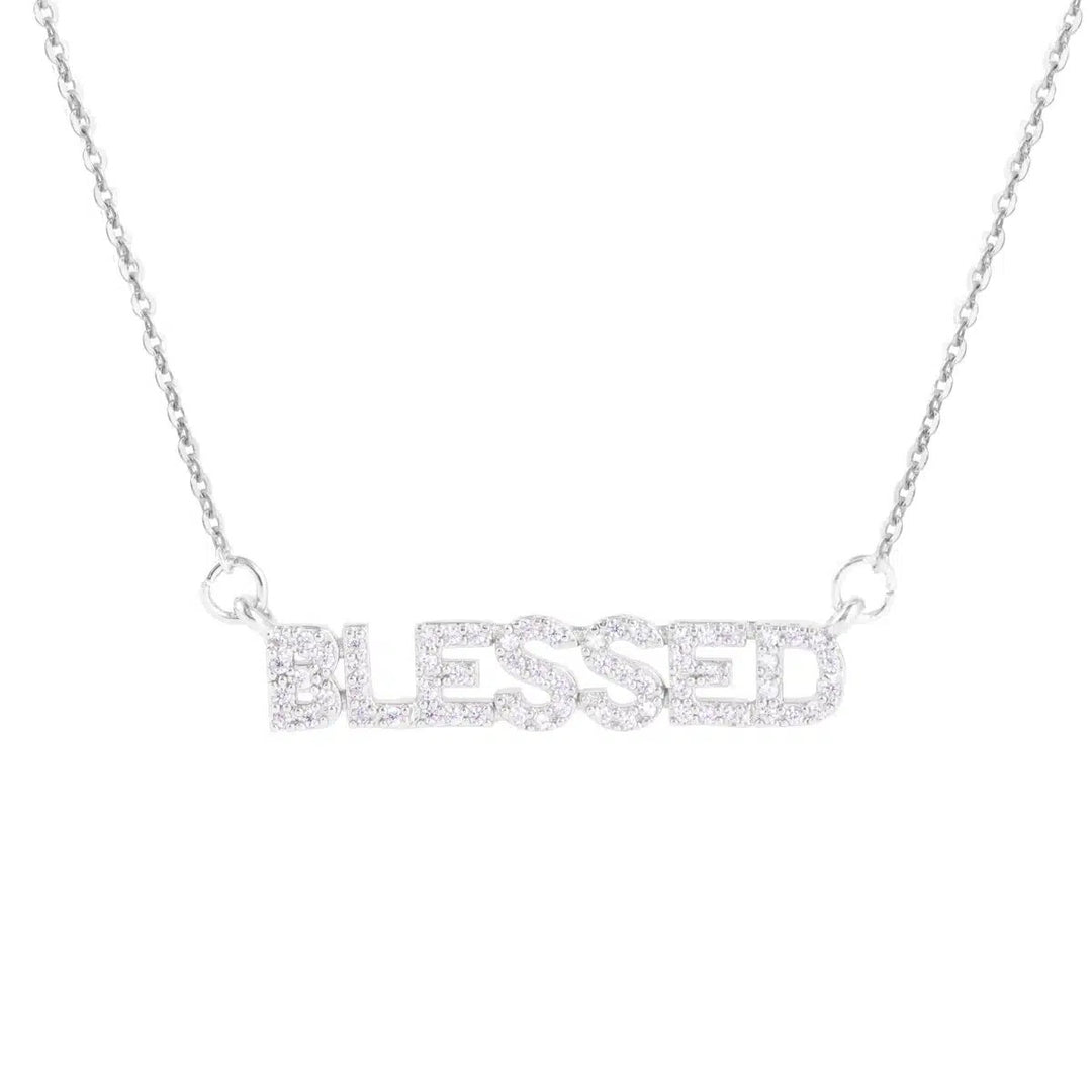 Silver Blessed monogram necklace featuring a sparkling crystal-encrusted word pendant on a chain.