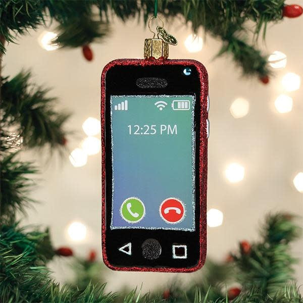 Mouth-blown glass smartphone ornament with hand-painted silver accents and glitter finish in a festive silhouette.