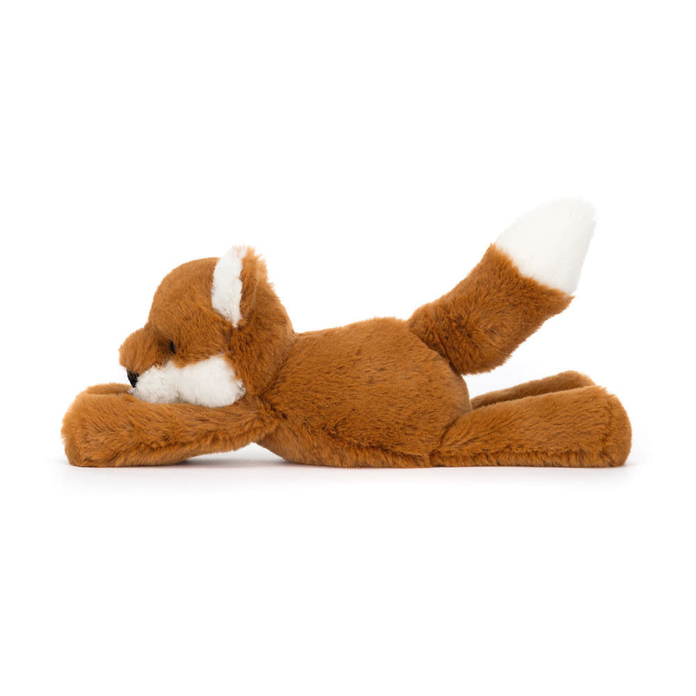 Side view of Smudge Fox plush toy in dark orange polyester with cream ears, muzzle, and tail tip.