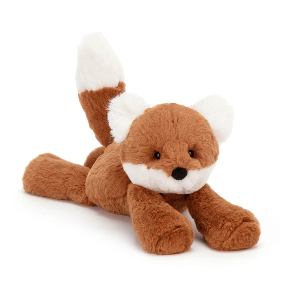 Dark orange polyester plush fox cub with cream ears muzzle tail tips sitting on a surface