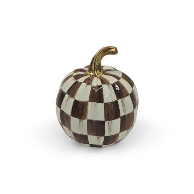 Handmade resin pumpkin with a chocolate checkered pattern on its surface.