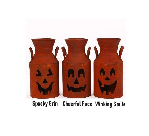 Rustic metal jack-o-lantern milk can luminary with carved pumpkin face silhouette