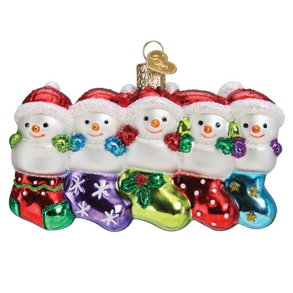 Snow Family Of 5 Ornament featuring five stylized figures in white snow texture with red accents.