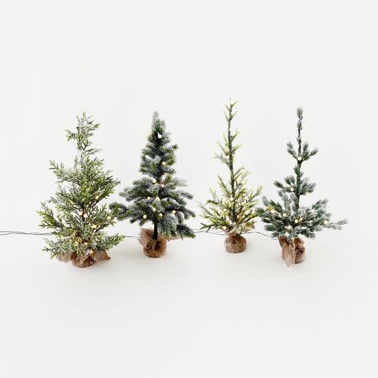 Small PVC snowy lighted tree with white branches and warm lights
