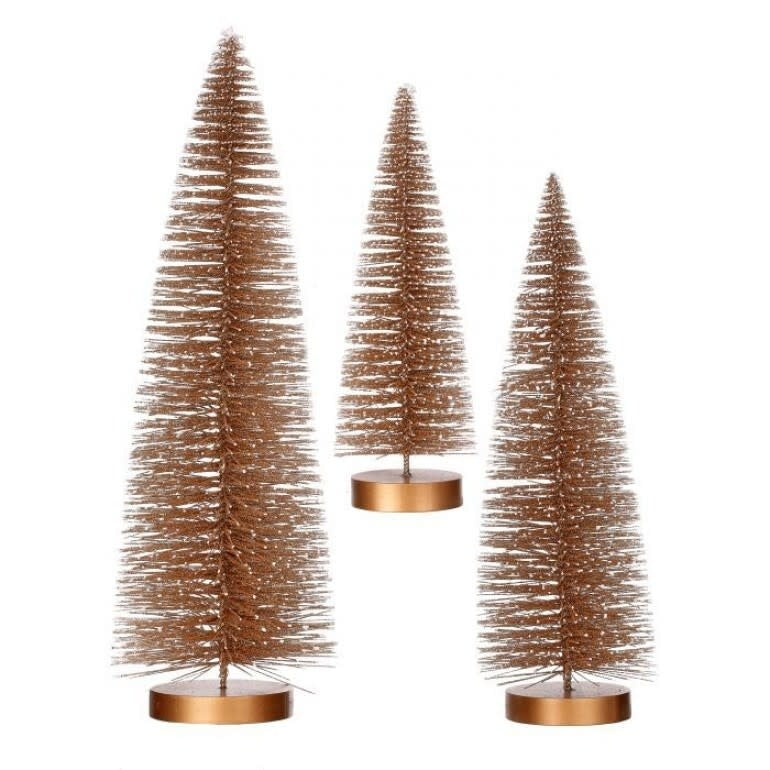 Champagne-colored artificial bristle tree ornament with white snow-tipped branches.