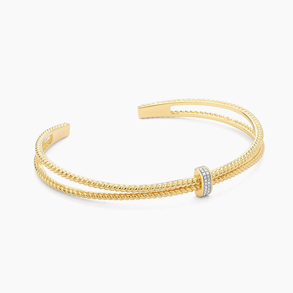 Silver half cuff bracelet featuring natural diamonds with an open oval silhouette.