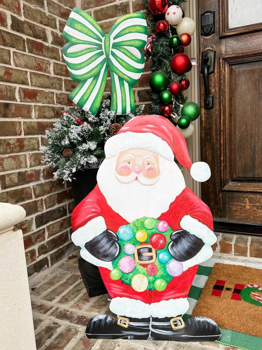 Merry & Bright Santa stake ornament featuring a red suit with white trim on a natural wood base.