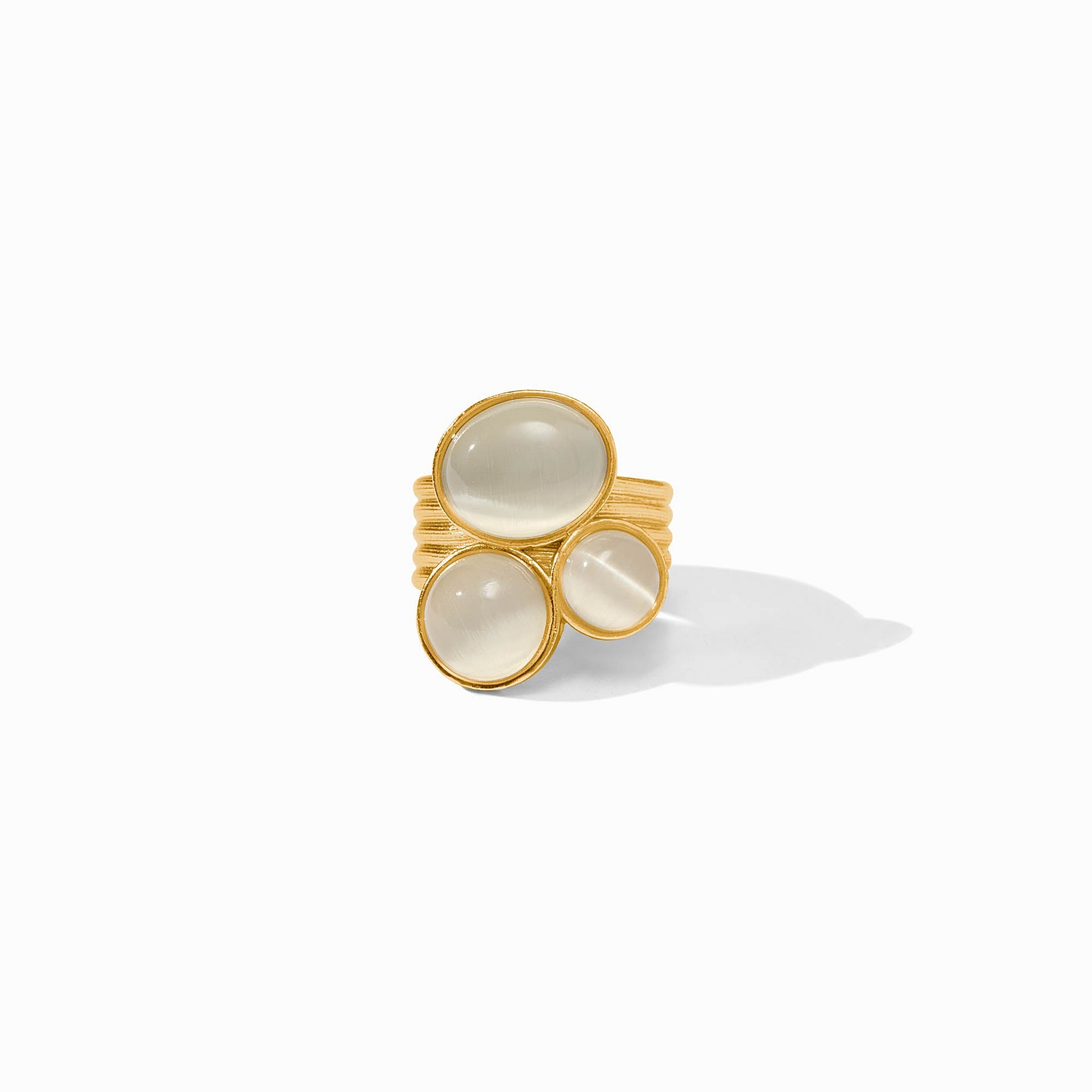 Cobblestone Statement Ring in 24K gold plate featuring three iridescent white glass stones.