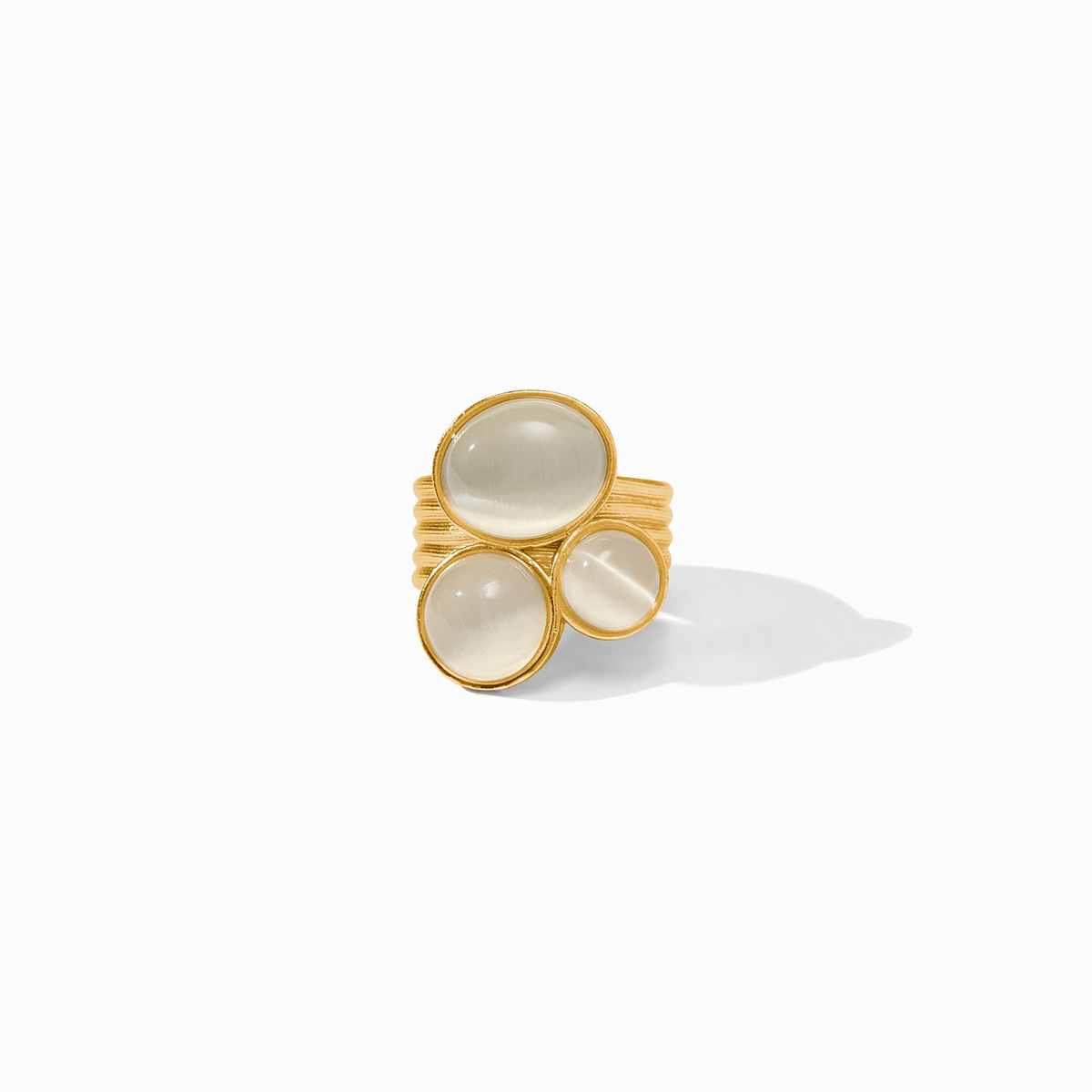Cobblestone Statement Ring in 24K gold plate featuring three iridescent white glass stones.