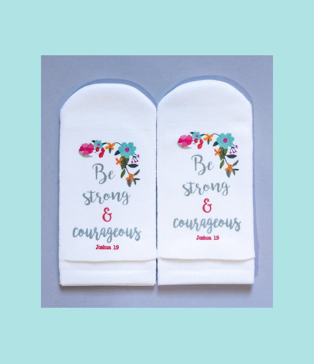 White no-show socks with floral design and the text "Be strong & courageous Joshua 1:9".
