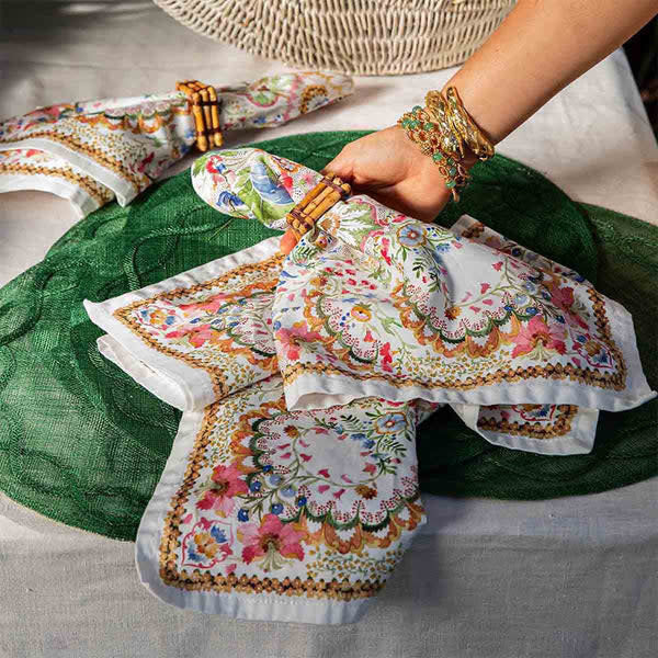 Multi-colored cotton sateen linen napkin with a relaxed rectangular shape.